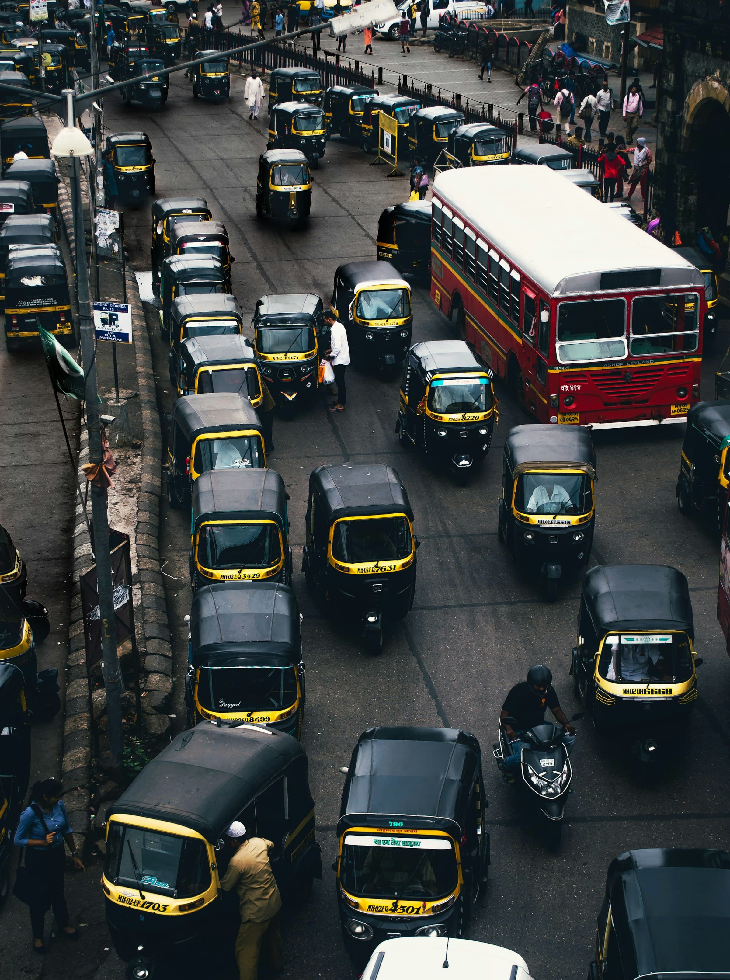 Yellow-and-black autos jammed in Mumbai traffic